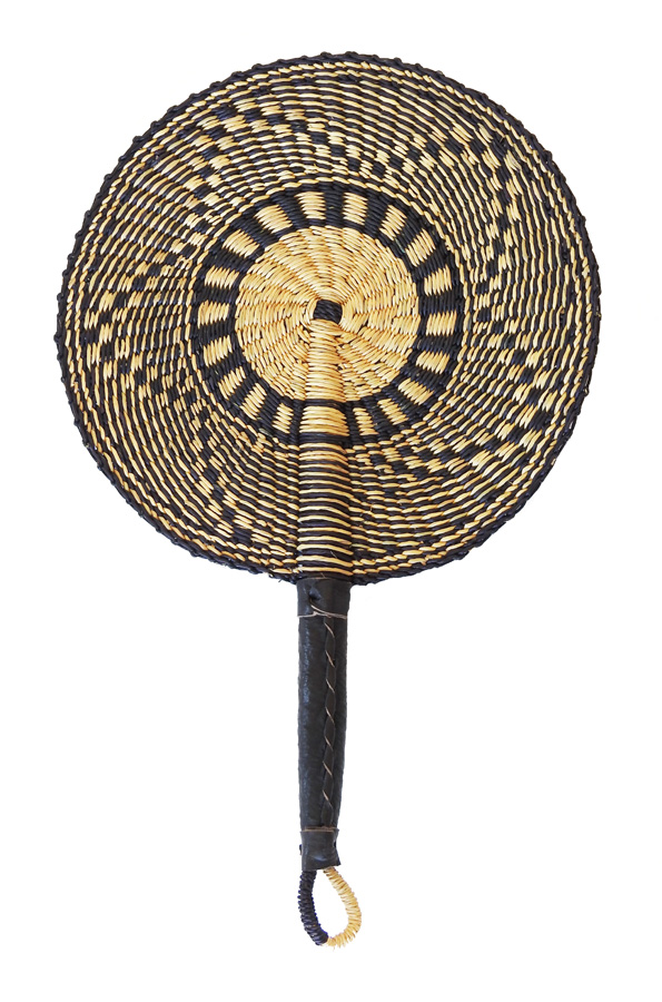 This sturdy, durable hand fan is woven from elephant grass using ...